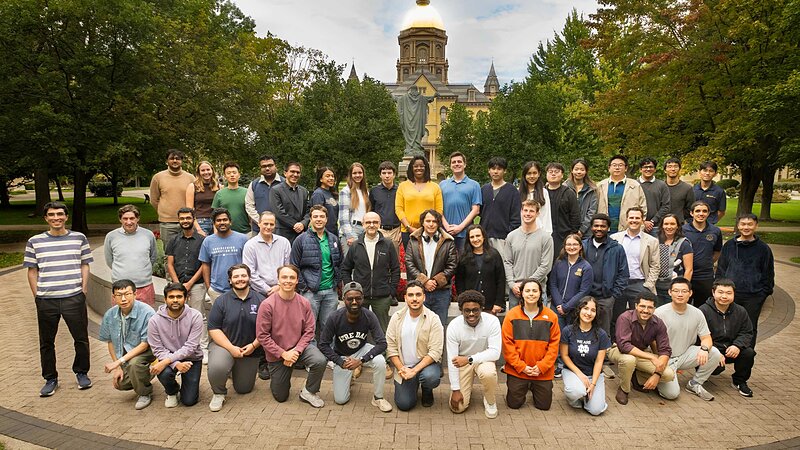 Robotics students and faculty in front of the Main Building at Notre Dame